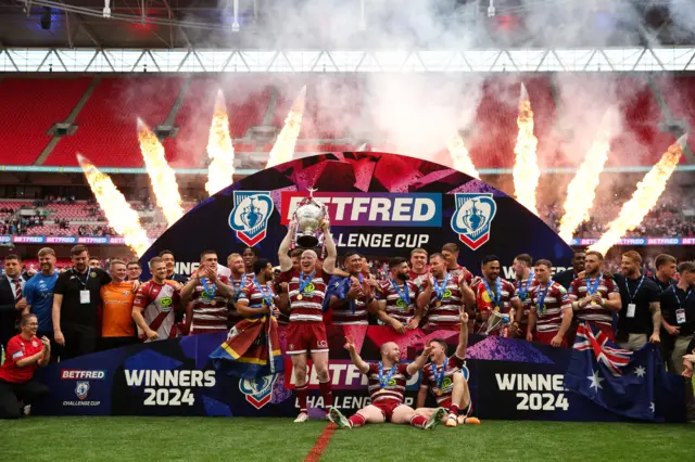 Wigan with the Challenge Cup at Wembley in June