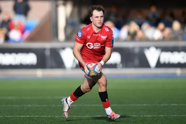 Ioan Lloyd carries for Scarlets