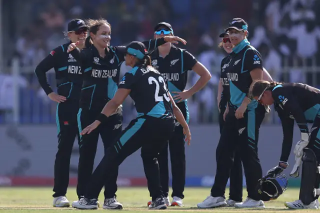 Amelia Kerr of New Zealand celebrates with team mates