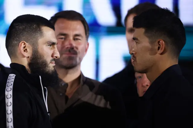 Artur Beterbiev and Dmitry Bivol stand face-to-face