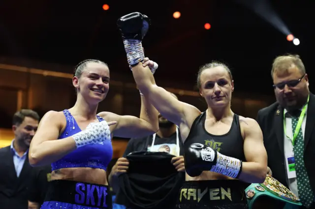 Skye Nicolson gives respect to Raven Chapman by holding up her hand in the ring