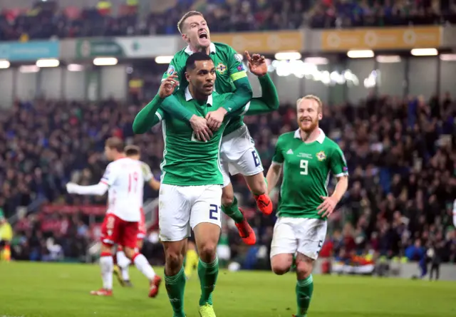 Josh Magennis celebrates scoring