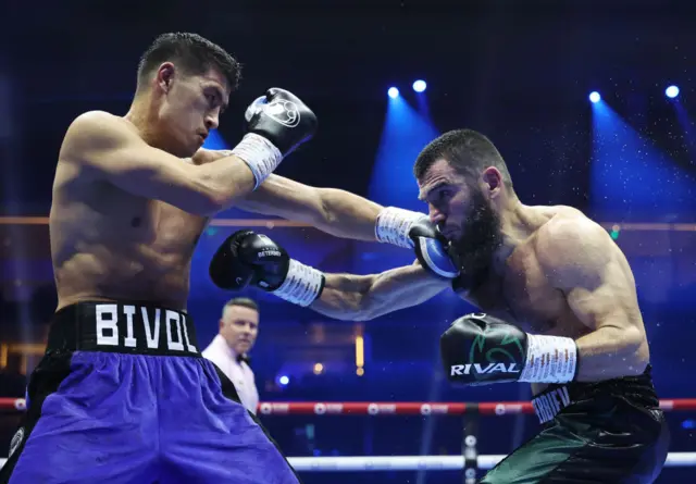 Dmitry Bivol punches Artur Beterbiev