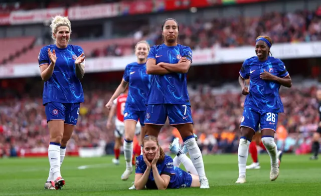 Ramirez celebrates the opening goal with teammates