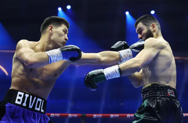 Dmitry Bivol jabbing Artur Beterbiev