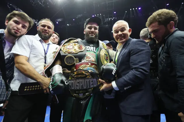 Artur Beterbiev with his undisputed title