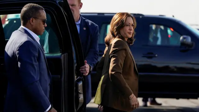 Kamala Harris walking out of a car.