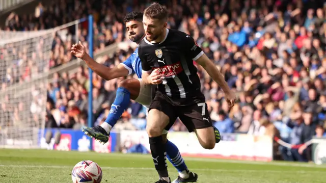 Notts County's Dan Crowley battles with Chesterfield's Dilan Markanday