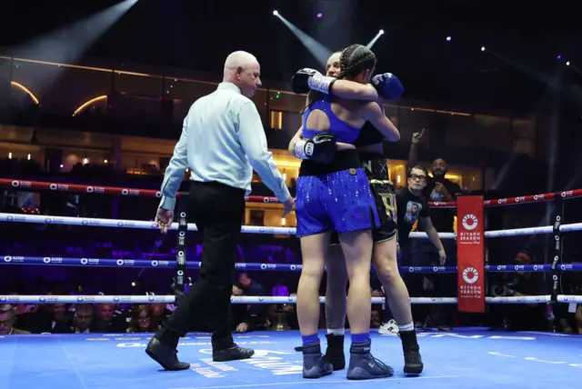 Skye Nicolson hugs Raven Chapman in the ring