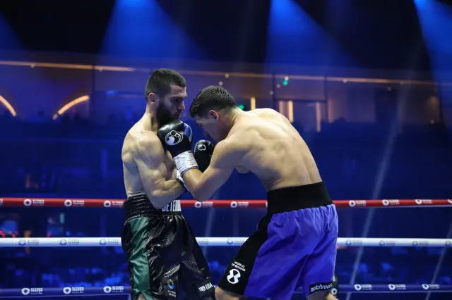 Artur Beterbiev hits Dmitry Bivol with an uppercut