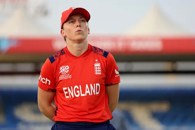 Heather Knight of England looks on