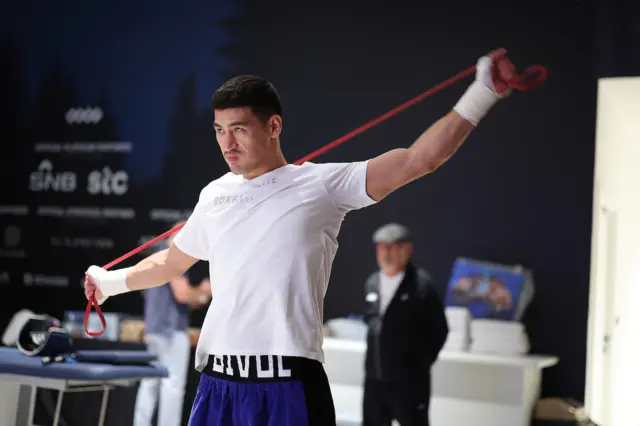 Dmitry Bivol uses a stretch rope