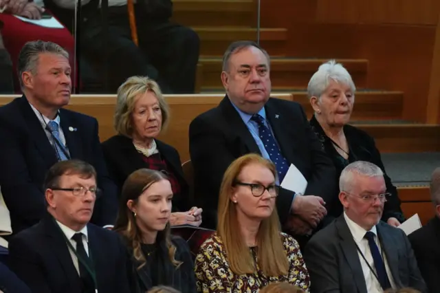 Former first minister Alex Salmond listens as King Charles III addresses the Holyrood Chamber during a visit to the Scottish Parliament in Edinburgh to mark its 25th anniversary on September 28, 2024 in Edinburgh, Scotland.