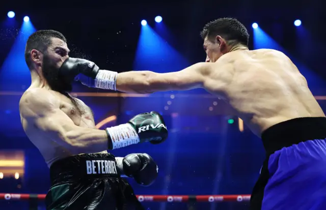 Dmitry Bivol lands a straight left on Artur Beterbiev