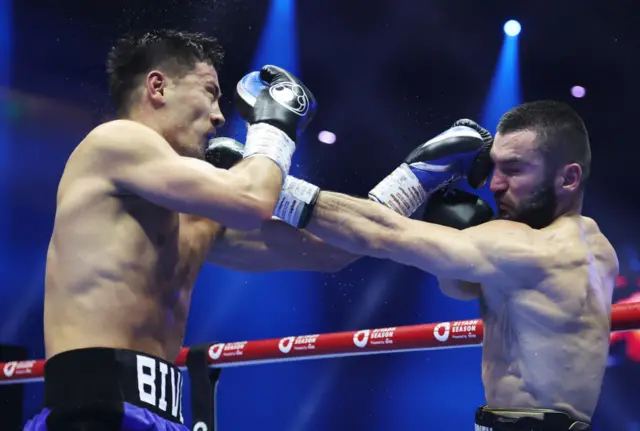 Artur Beterbiev lands a left jab