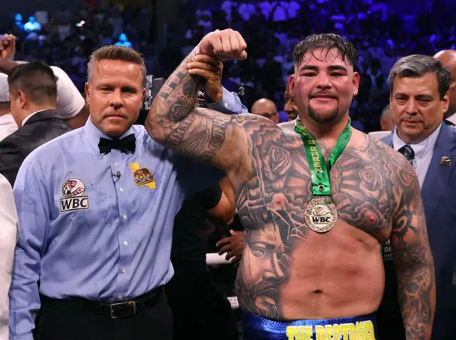 Referee Thomas Taylor holds up Andy Ruiz's arm