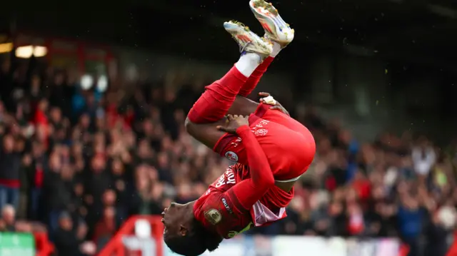 Crawley's Armando Junior Quitirna celebrates scoring against Shrewsbury