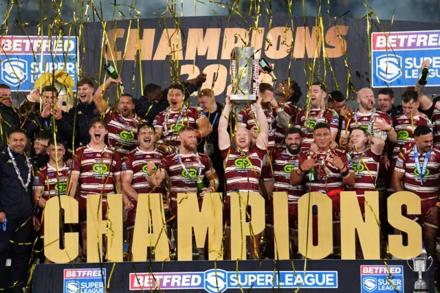 Wigan Warriors lifting the Super League trophy