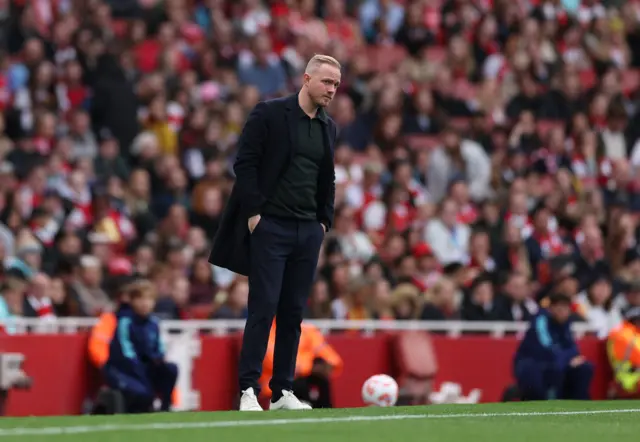 Jonas stands looking forlorn on the sideline