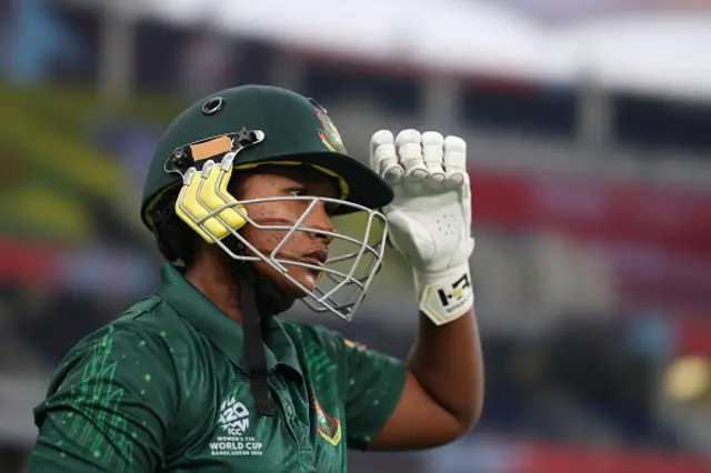 Shathi Rani of Bangladesh walks out to bat