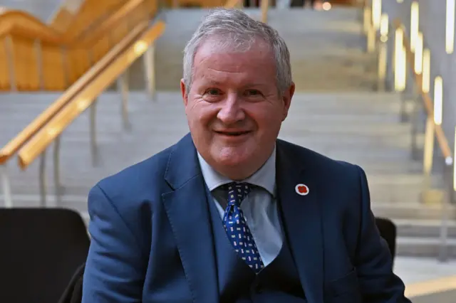 SNP MP and former Westminster leader Ian Blackford relaxes with a coffeein the lobby of the Scottish Parliament, on November 9, 2023