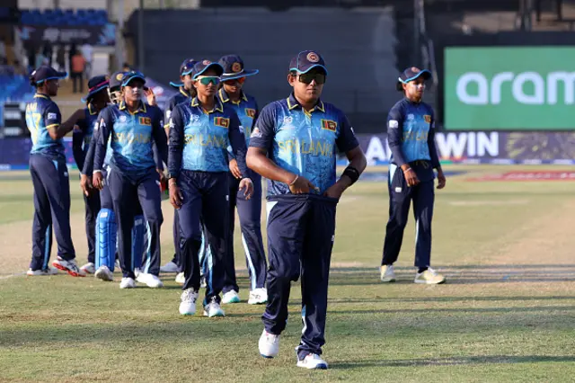 Chamari Athapaththu of Sri Lanka leads her team off