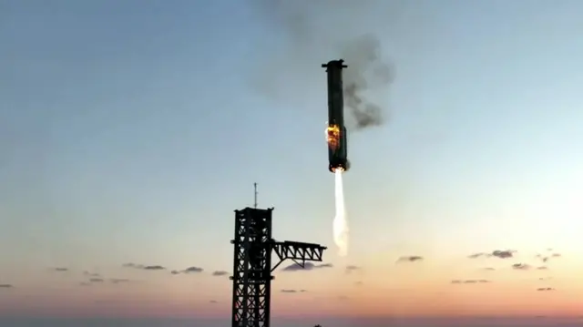 Booster returns to launchpad