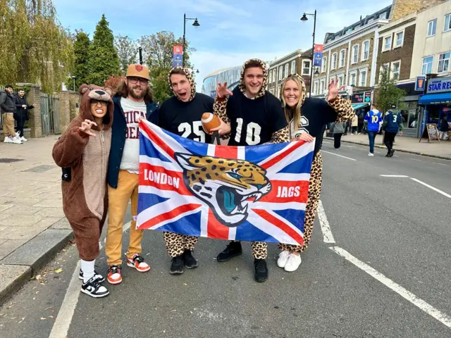 Jacksonville Jaguars and Chicago Bears fans in fancy dress