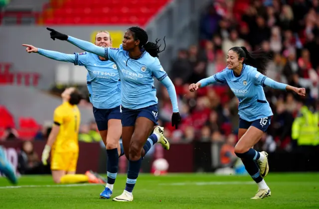 Khadija Shaw (centre) celebrates