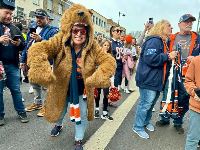 A Chicago Bears fan in a bear jacket