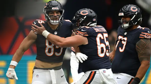 Chicago Bears celebrate a Cole Kmet touchdown