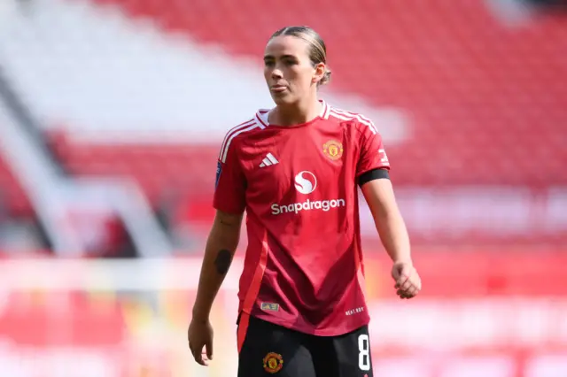 Grace Clinton playing for Manchester United