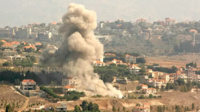 Smoke rises from the site of an Israeli air strike that targeted the southern Lebanese village of Khiam on Sunday