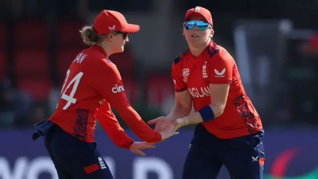 Heather Knight celebrates with teammate Charlie Dean during the Women's T20 World Cup