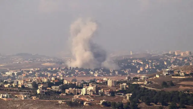 Smoke rising from the site of an Israeli air strike that targeted Kfar Tibnit in Lebanon on Sunday