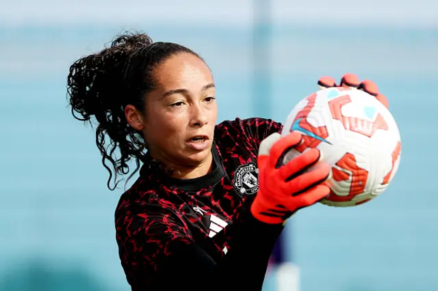 Phallon Tullis-Joyce of Manchester United warms up