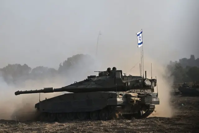 A Merkava tank flying an Israeli tank