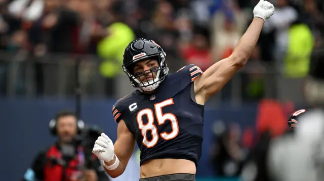 Cole Kmet celebrates a touchdown