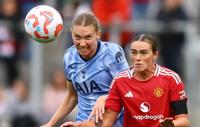 Tottenham Hotspur's Clare Hunt in action with Manchester United's Grace Clinton