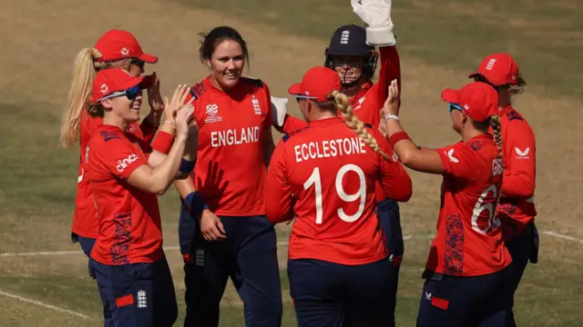 Nat Sciver-Brunt celebrates with teammates after taking the wicket of Saskia Horley in the Women's T20 World Cup