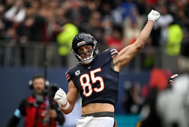 Cole Kmet celebrates scoring a touchdown for Chicago Bears against Jacksonville Jaguars