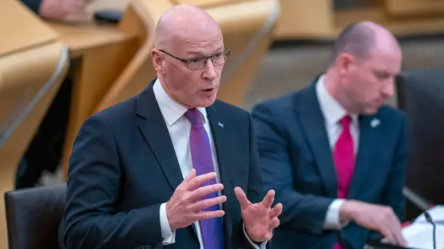 John Swinney during First Minister's Questions at the Scottish Parliament in Holyrood