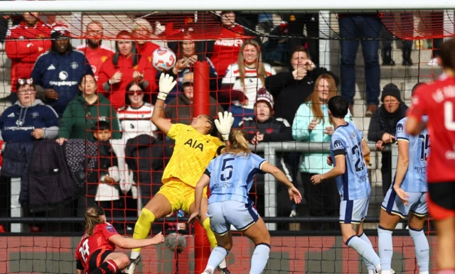 Manchester United's Elisabeth Terland scores their first goal past Tottenham Hotspur's Rebecca Spencer