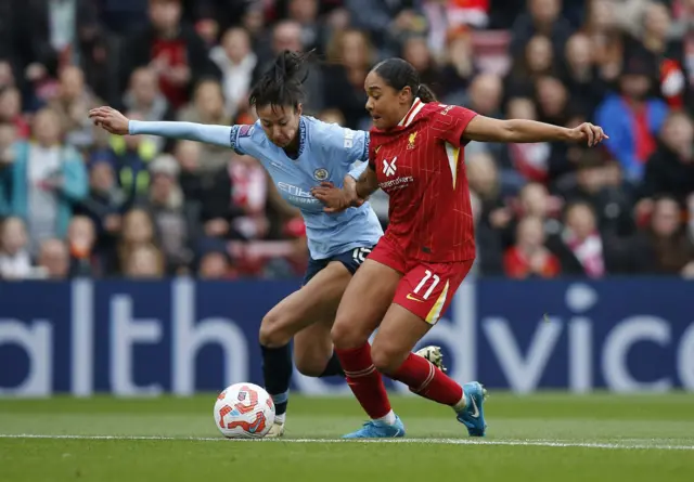 Manchester City's Leila Ouhabi in action with Liverpool's Olivia Smith