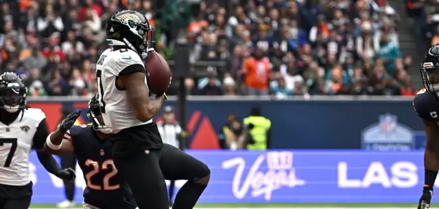 Gabe Davis attempts to catch a pass