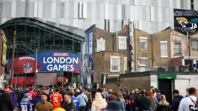 Fan arrive at Tottenham Hotspur Stadium