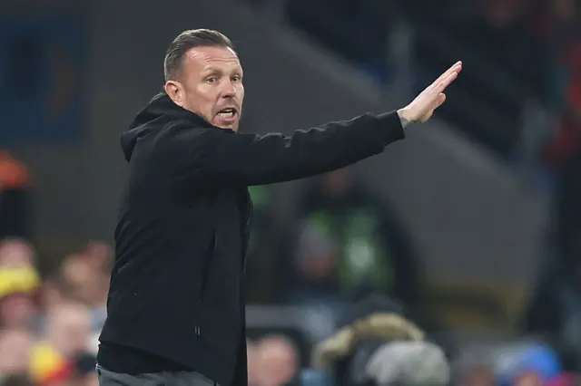 Craig Bellamy on the touchline