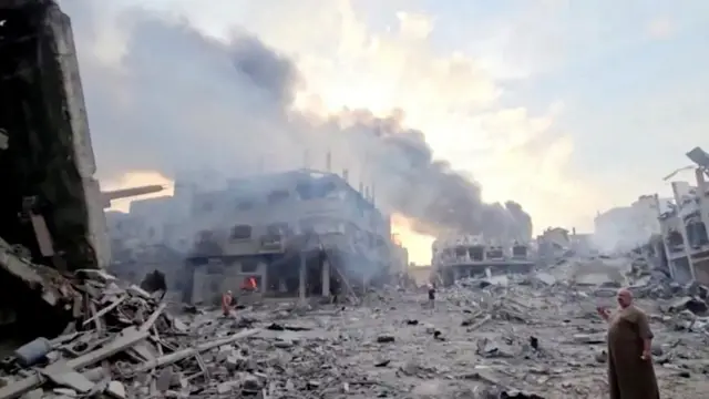 Smoke rising after a strikes on Gaza's Jabalia refugee camp