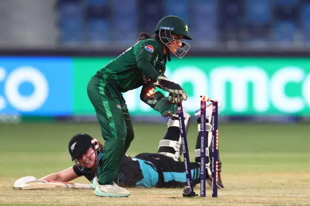 Georgia Plimmer dives to make her ground and avoid a run out