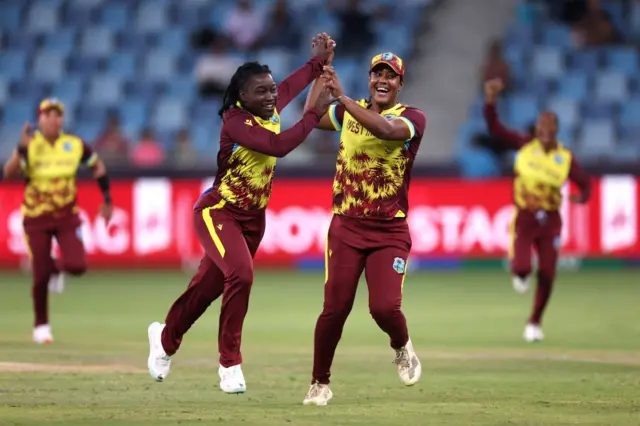 Deandra Dottin celebrates the run out of Alice Capsey